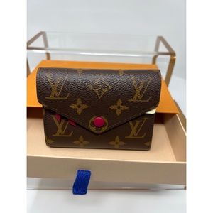 Louis Vuitton Victorine Monogram Wallet In Fuchsia Pink With Pink Press Stud